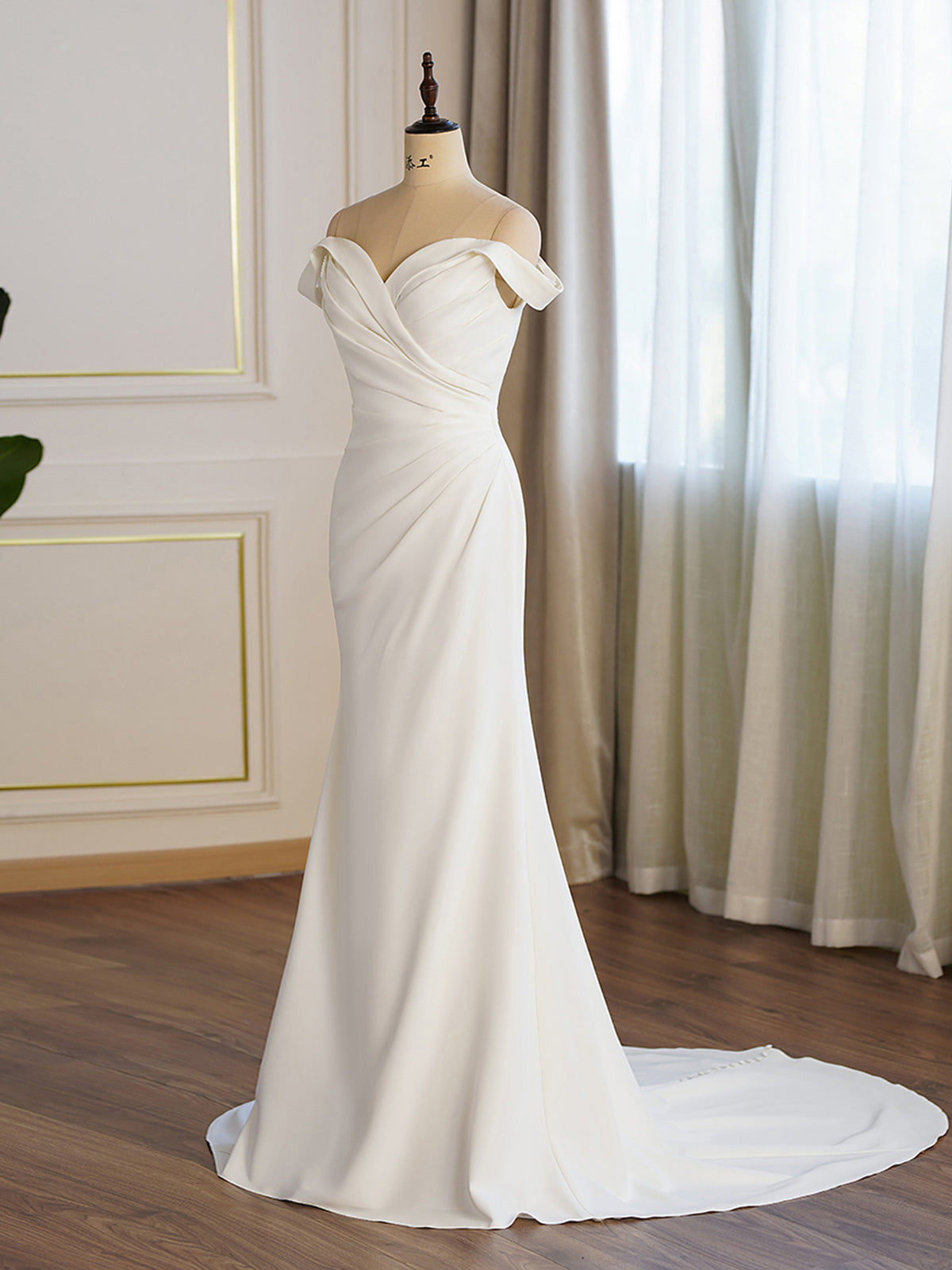 Off-the-shoulder Pleated Fit And Flare Crepe Wedding Dress